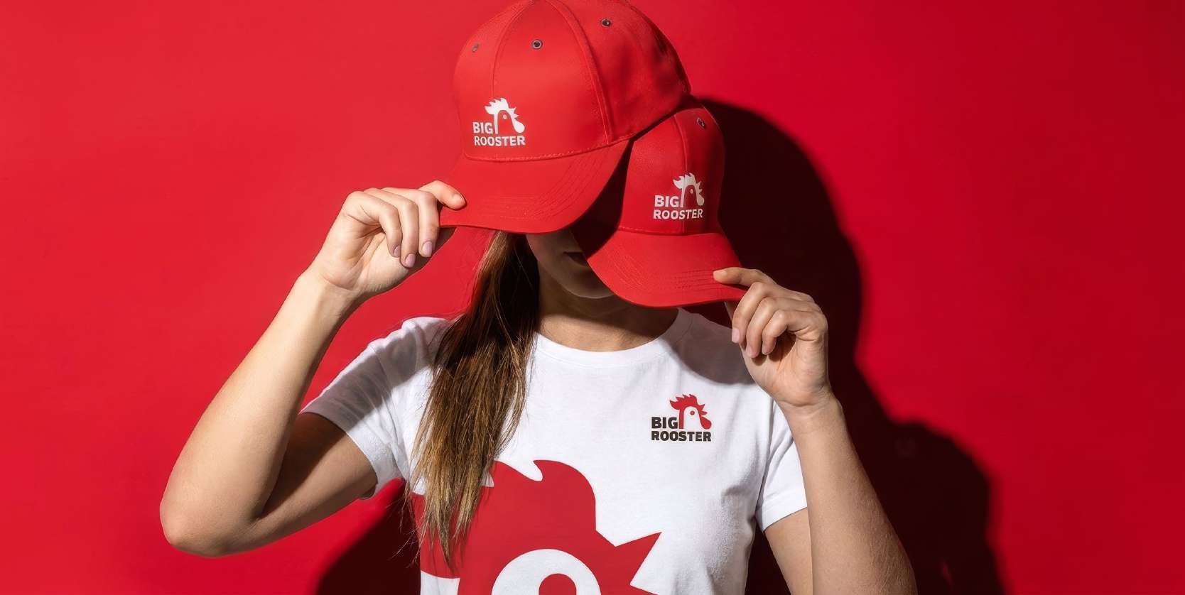 Model wearing Big Rooster caps